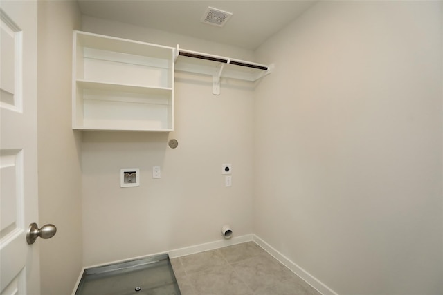 laundry area with washer hookup, light tile patterned floors, and hookup for an electric dryer