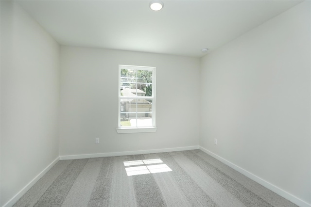 spare room with carpet floors