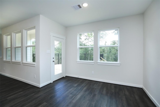 doorway featuring dark wood-type flooring