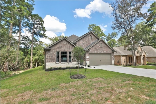 craftsman-style house featuring a garage and a front lawn