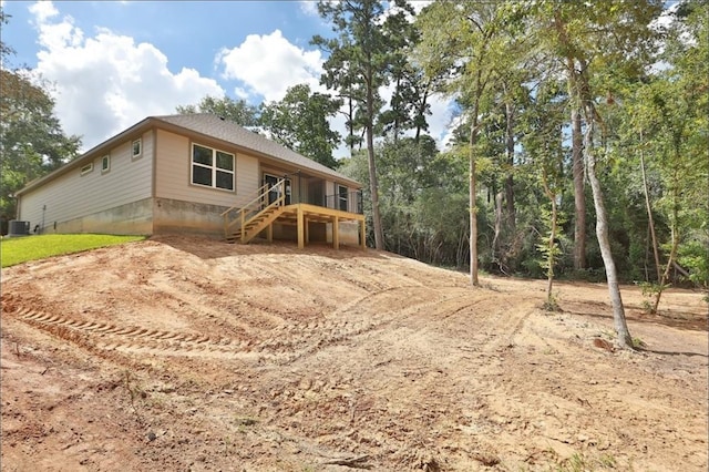 view of front of house featuring central AC