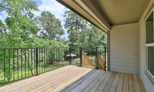 12135 Mustang Ave, Willis, TX 77378 - deck featuring view of wooded area