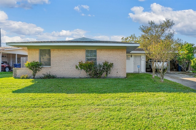 ranch-style house with a front yard