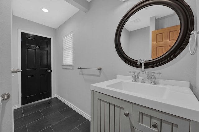 bathroom with vanity and tile patterned flooring