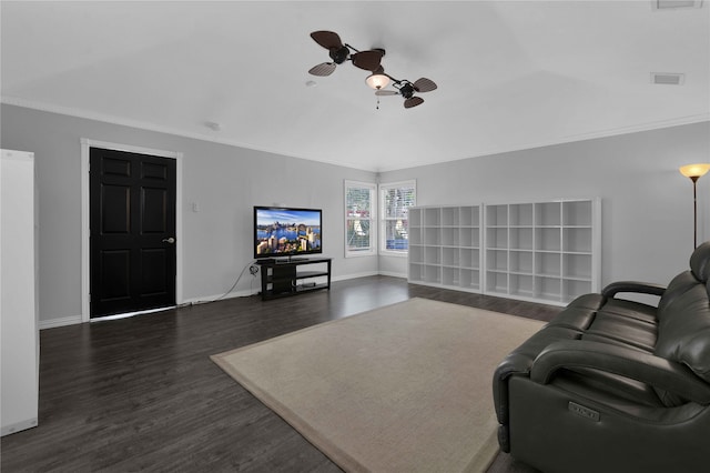 living room featuring ornamental molding, lofted ceiling, ceiling fan, and dark wood-type flooring