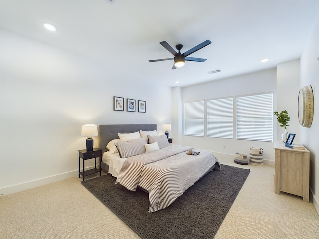 carpeted bedroom with ceiling fan