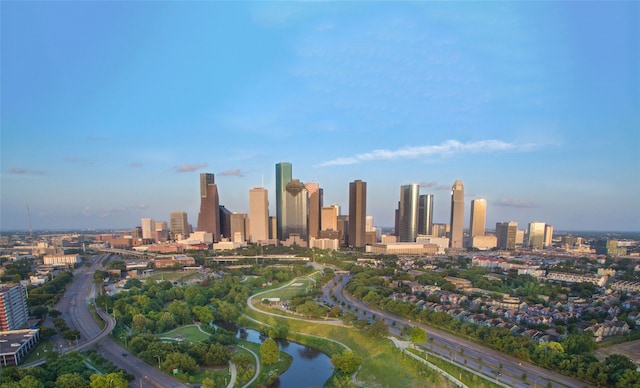 property's view of city with a water view