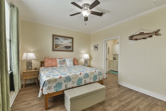 bedroom featuring light wood-type flooring, crown molding, and ceiling fan