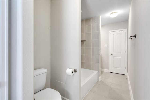 bathroom featuring toilet and tile patterned floors