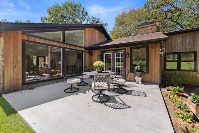 rear view of house with a patio