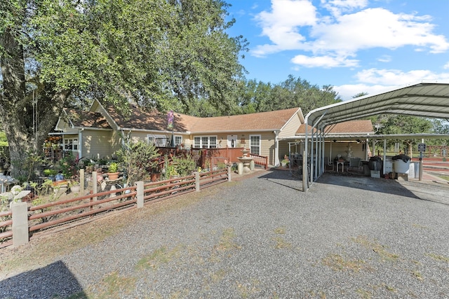 view of front facade with a carport