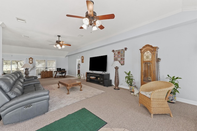 carpeted living room featuring ceiling fan, ornamental molding, and vaulted ceiling