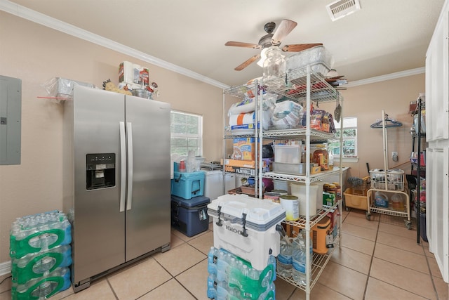 storage featuring electric panel and ceiling fan