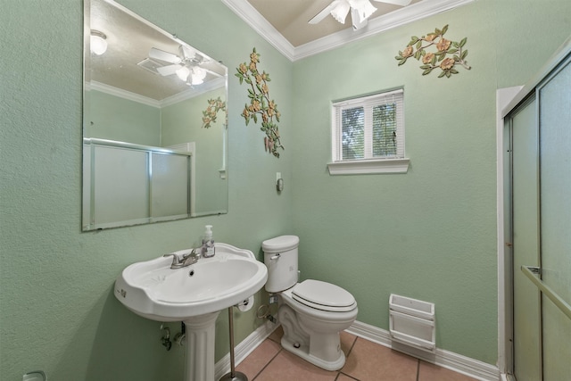 bathroom featuring tile patterned flooring, walk in shower, ceiling fan, toilet, and ornamental molding