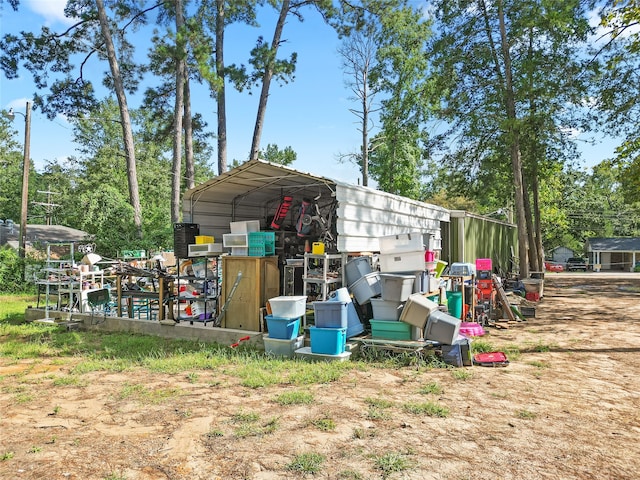 view of yard with a carport