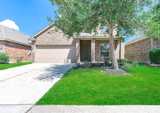 view of front of home with a garage and a front lawn