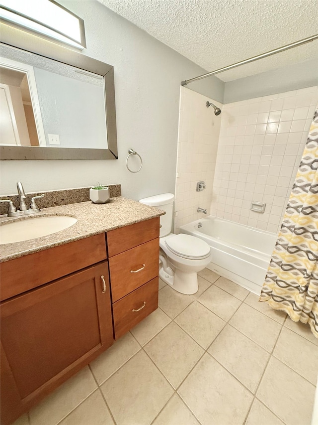 full bathroom featuring vanity, toilet, a textured ceiling, and shower / bath combo