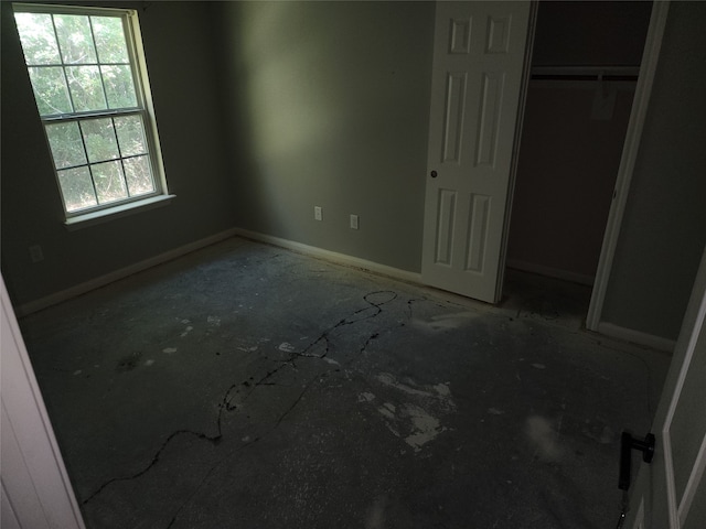 unfurnished bedroom featuring a closet