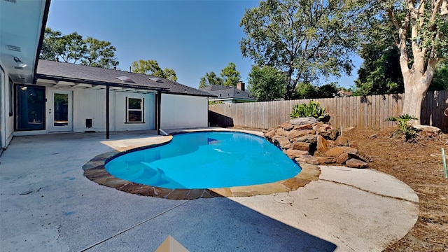 view of swimming pool featuring a patio