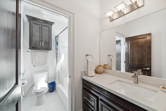 full bathroom with shower / bath combo with shower curtain, tile patterned floors, vanity, and toilet