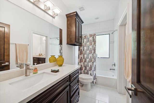 full bathroom with vanity, tile patterned floors, toilet, and shower / bath combo