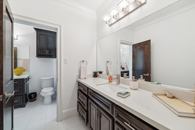 bathroom featuring ornamental molding, tile patterned floors, vanity, and toilet