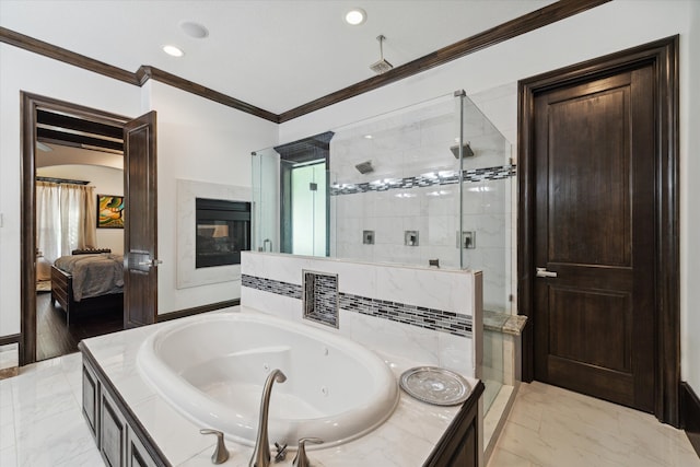 bathroom with ornamental molding and independent shower and bath