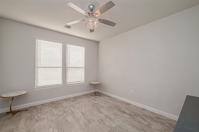 unfurnished room featuring ceiling fan