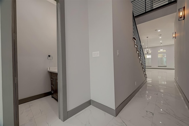 2322 Tuam, Houston, TX 77004 - hallway with light marble finish flooring and stairway