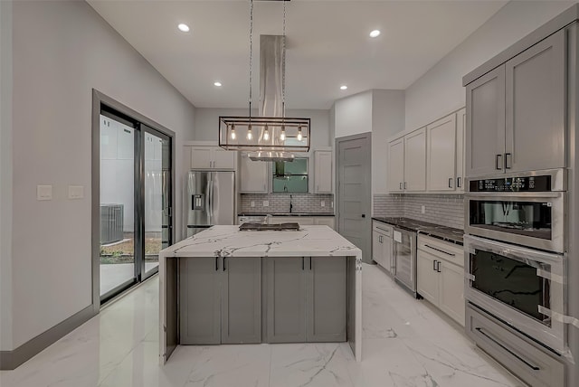 2322 Tuam, Houston, TX 77004 - kitchen featuring stainless steel appliances, beverage cooler, decorative backsplash, a center island, and recessed lighting