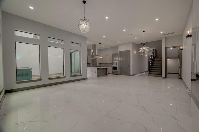 2322 Tuam, Houston, TX 77004 - unfurnished living room featuring a chandelier, stairway, recessed lighting, and light marble finish floors