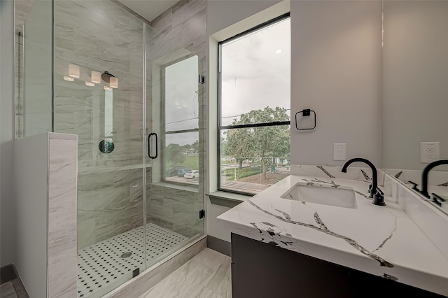 2322 Tuam, Houston, TX 77004 - full bath featuring vanity, a marble finish shower, and marble finish floors