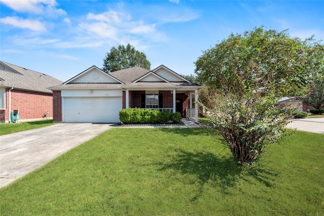 view of front of home featuring a front yard, a porch, and a garage