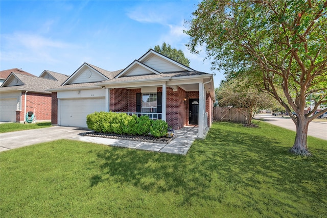 view of front of house featuring a garage, a front yard, and covered porch