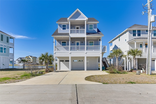 beach home with a balcony and a garage