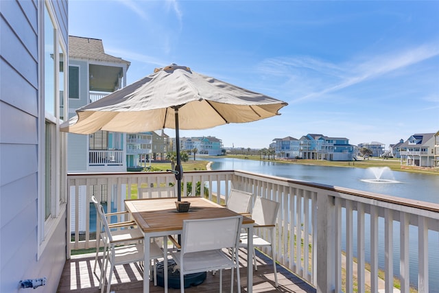 deck featuring a water view