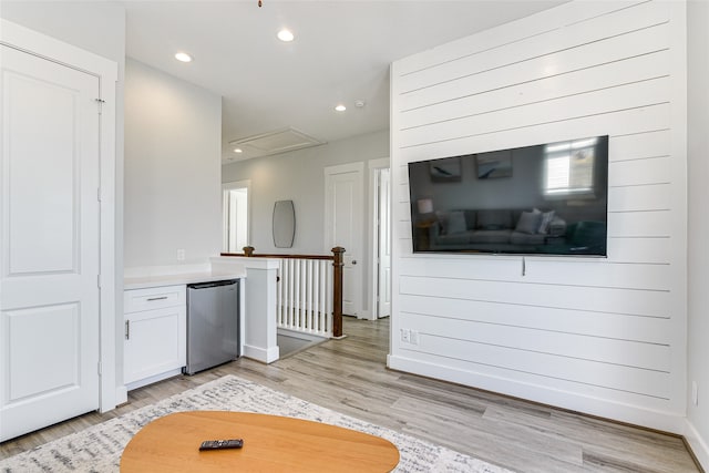 unfurnished living room featuring light hardwood / wood-style floors