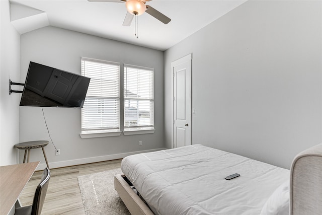 bedroom with light wood-type flooring and ceiling fan