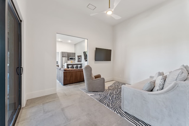 living room with ceiling fan