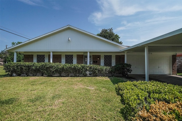 view of front facade with a garage, a porch, and a front lawn