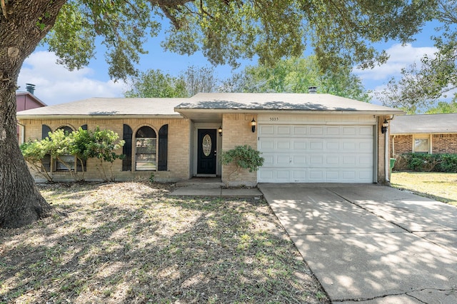 single story home featuring a garage