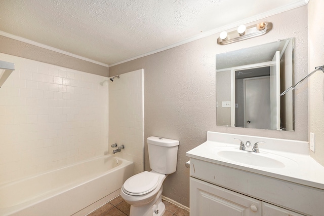 full bathroom featuring toilet, tile patterned floors, tiled shower / bath combo, vanity, and a textured ceiling