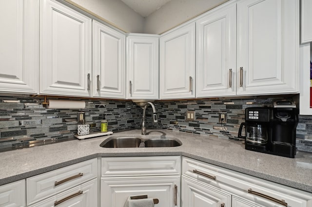 kitchen with white cabinets and sink