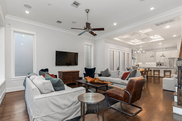 living room with crown molding, coffered ceiling, dark hardwood / wood-style flooring, and ceiling fan with notable chandelier