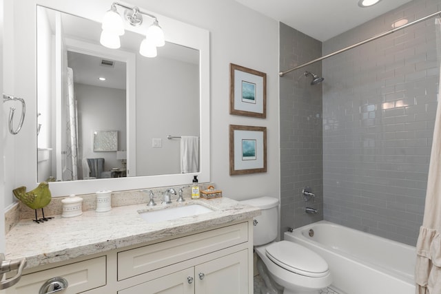 full bathroom featuring toilet, vanity, and shower / tub combo with curtain