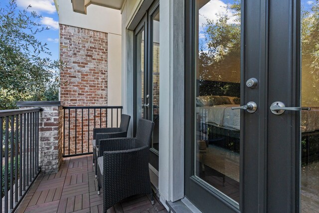 balcony featuring french doors