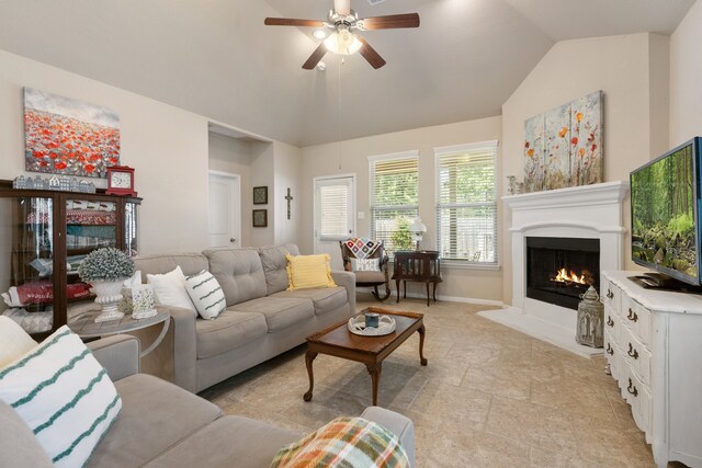 living room with ceiling fan and lofted ceiling