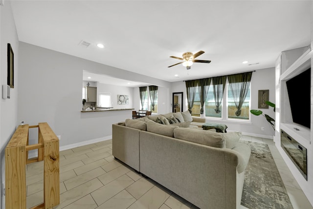 living room with ceiling fan