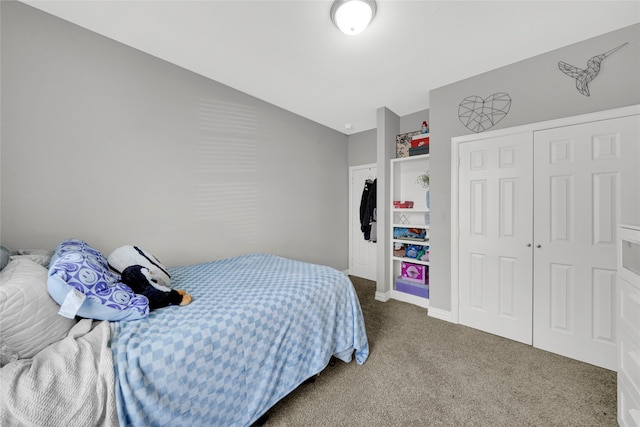 carpeted bedroom with a closet