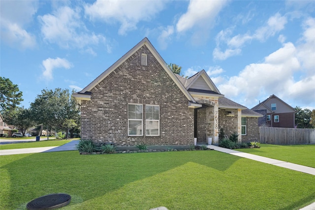 view of front facade with a front lawn